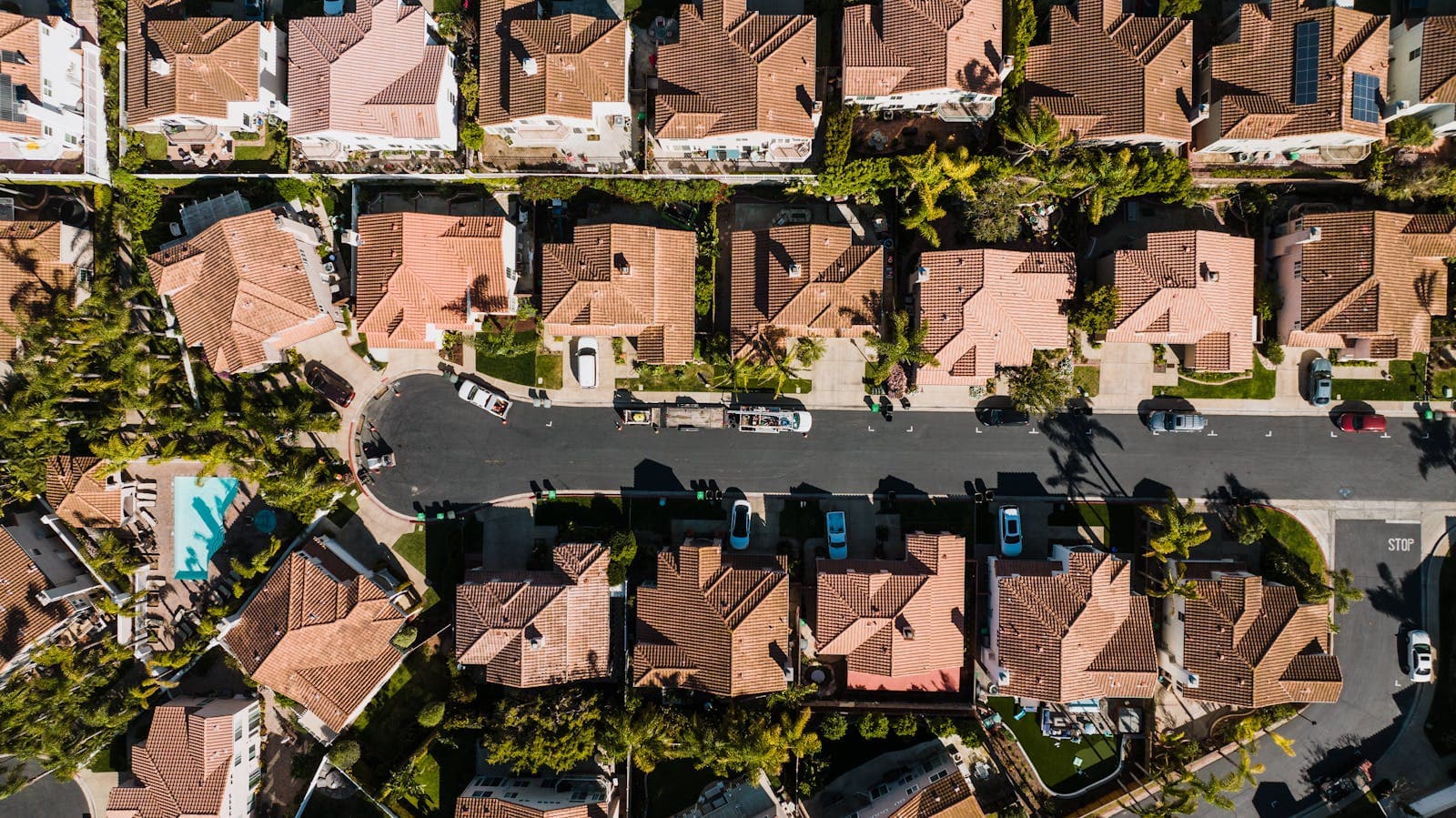 Aerial view of a Costa Mesa residential neighborhood with rows of homes and clean streets